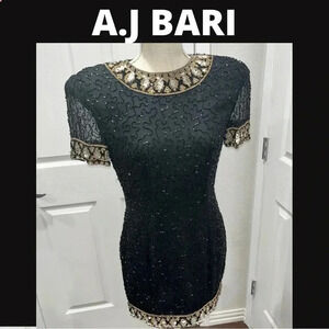 Vintage A.J Bari 100% silk, fully beaded, cocktail mini dress, shoulder pads
